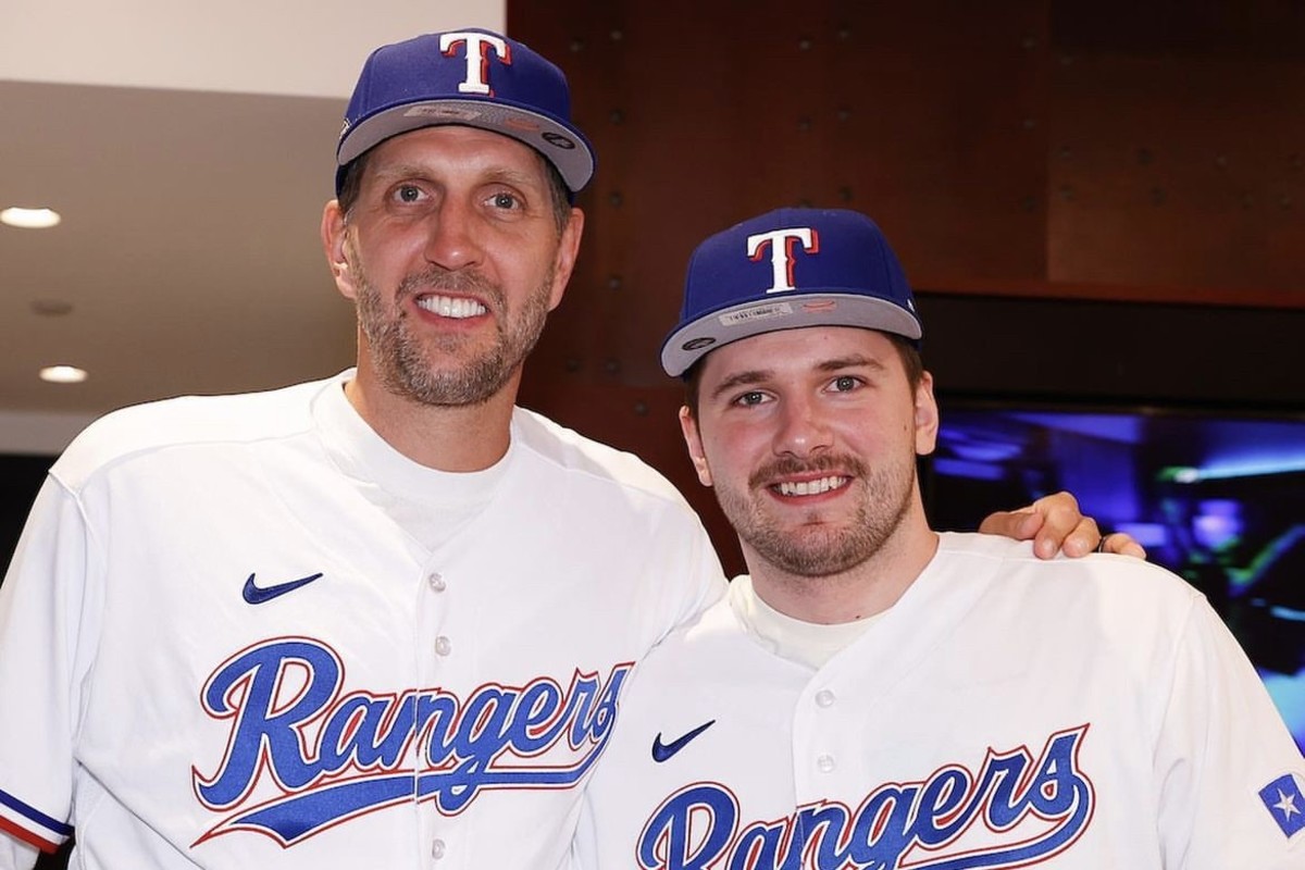 Dirk Nowitzki and Luka Doncic take in a Texas Rangers postseason game together.